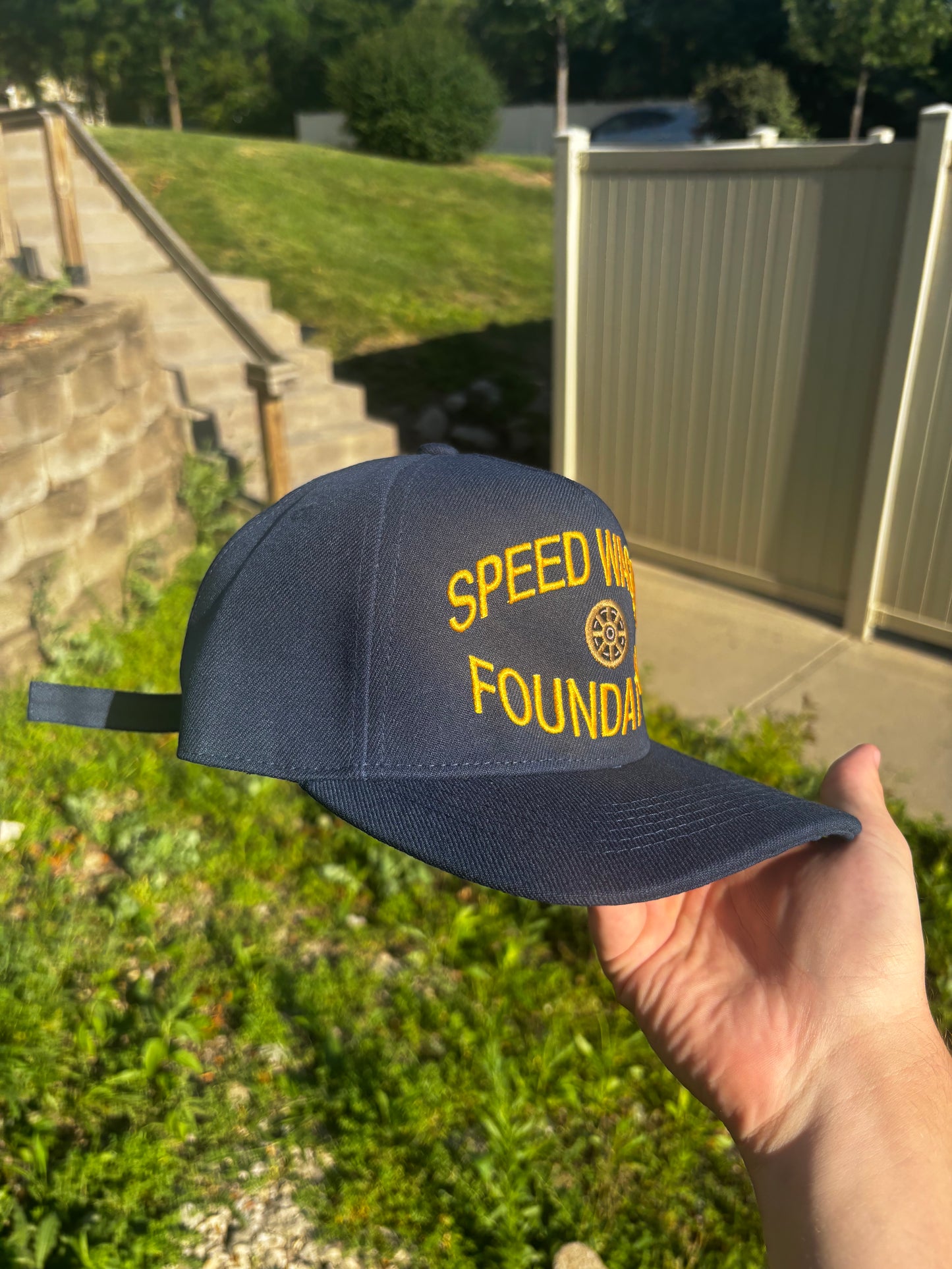 "SPEEDWAGON” 5oz Snapback Embroidered Cap